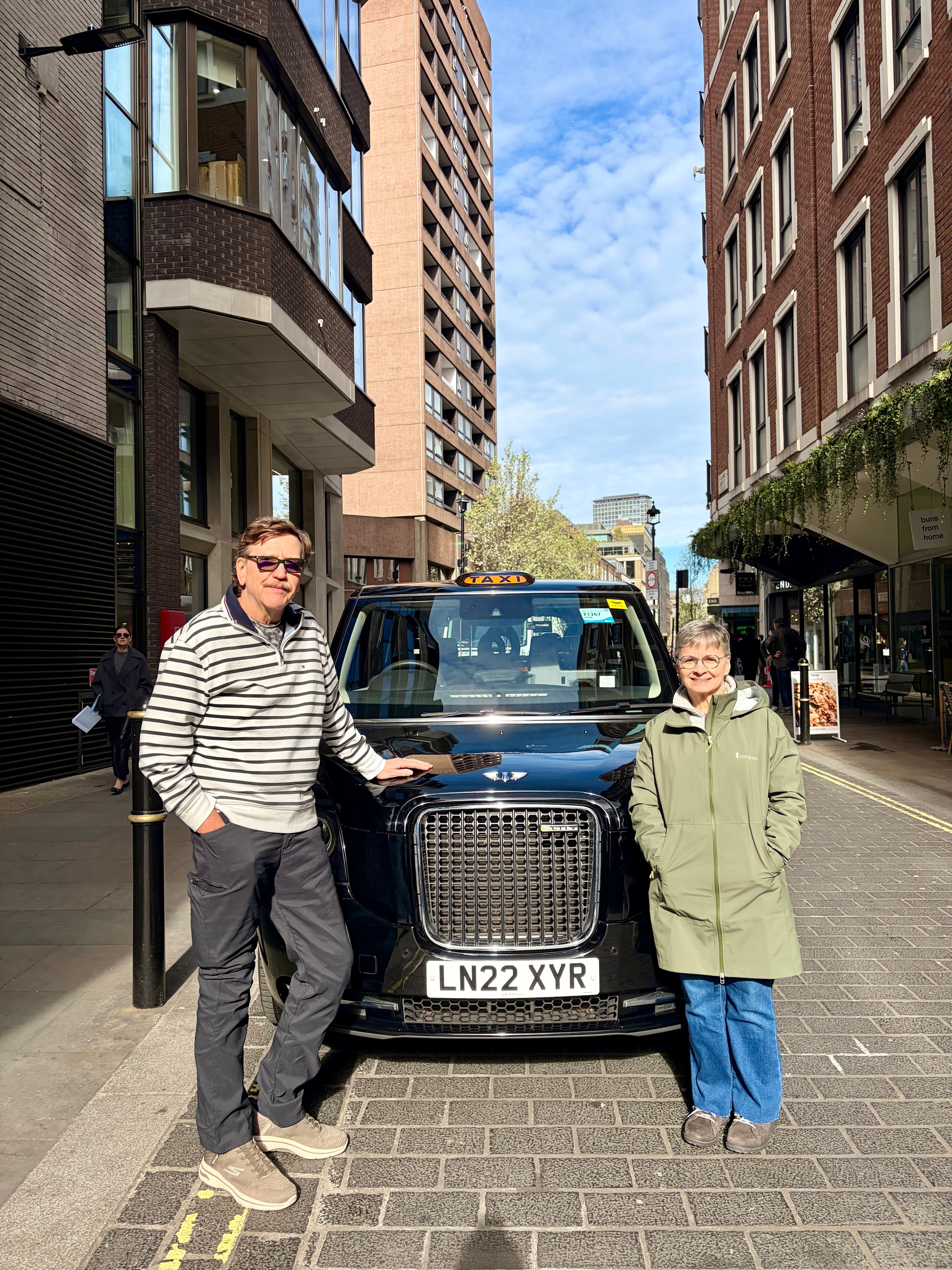 Couple with a London black cab
